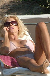Victoria Silvstedt blonde stunner at the beach