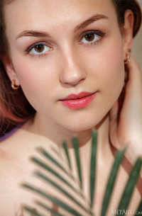 Isabele Seduces From The Couch Showing Her Smooth Skin And Eager Passion