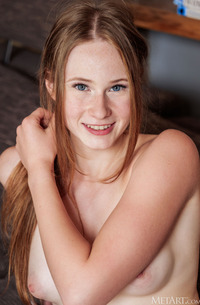 Zuzanna Shows Off Her Pretty Blue Eyes And Natural Curls In Lingerie
