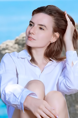 Nika Smiling With Pleasure As The Stimulating Ocean Breeze Caresses Her Sexy Body