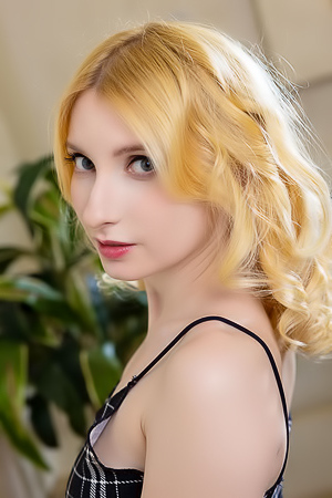 Minnie Lighter Squeezing Her Gorgeous Breasts And Smiles Seductively