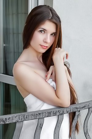 Donita Thighs Parted To Frame The Fluffy Curls Between Them