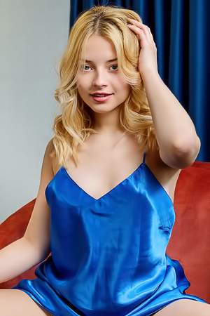 Bianca Bell Teases With Unbuttoned Chemise Lounging On Armchair