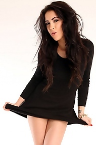 Gracy stretching her black skirt